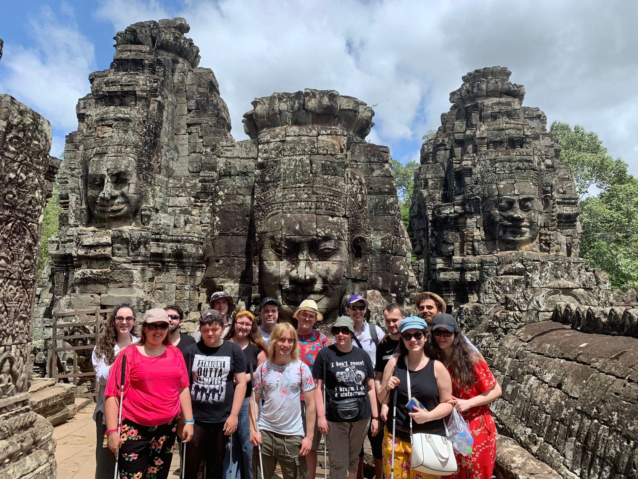 A group visiting the Angkor Wat temple complex in Cambodia